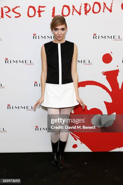 Model poses backstage at the Rimmel London 180 Years of Cool party at the London Film Museum on October 10, 2013 in London, England.