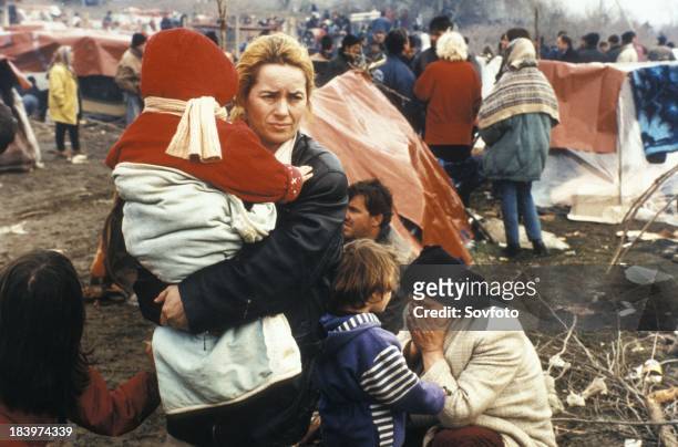 Kosovar Families, Fleeing The War In Kosovo, In An Over-Crowded Refugee Camp In Blace, Macedonia. April 1999.