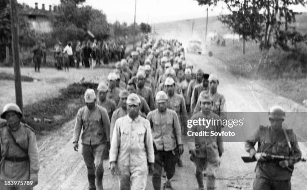 Operation August Storm . Japanese prisoners being led by Red Army troops in Li-shenchen. Manchuria. August 1945.