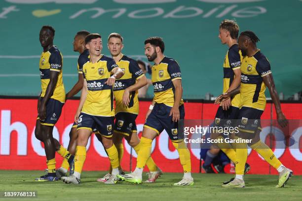 Alou Kuol of the Mariners celebrates his goal with team mates during the A-League Men round seven match between Central Coast Mariners and Western...