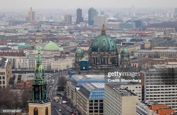 The Berlin Cathedral, center, and St. Mary's Church, left, on the city skyline in Berlin, Germany, on Friday, Dec. 8, 2023. Chancellor Olaf...