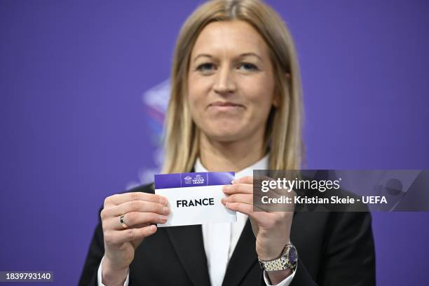 Special guest Janni Arnth Jensen draws out the card of France during the UEFA Women's Nations League 2023/24 Finals Draw at The House of European...