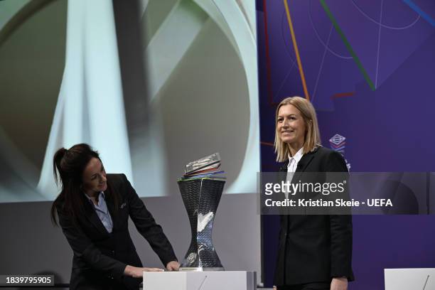 Managing Director of Women's Football Nadine Kessler and Special guest Janni Arnth Jensen unveil the UEFA Women's Nations League trophy during the...