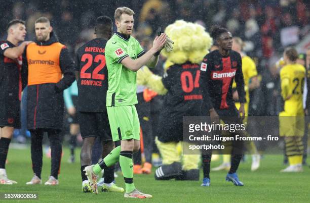 Lukas Hradecky of Bayer celebrates after the Bundesliga match between Bayer 04 Leverkusen and Borussia Dortmund at BayArena on December 3, 2023 in...