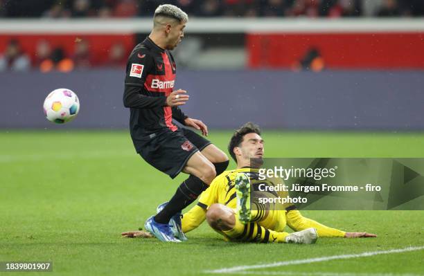 Exequiel Palacios of Bayer and Mats Hummels of Dortmund battle for the ball during the Bundesliga match between Bayer 04 Leverkusen and Borussia...