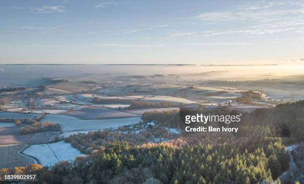 aerial view over devon countryside - devon winer stock-fotos und bilder