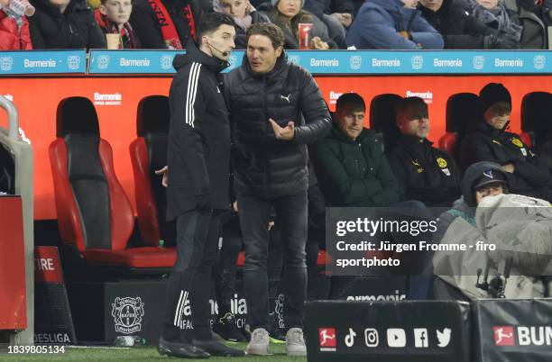 Edin Terzic Coach of Borussia gestures during the Bundesliga match between Bayer 04 Leverkusen and Borussia Dortmund at BayArena on December 3, 2023...