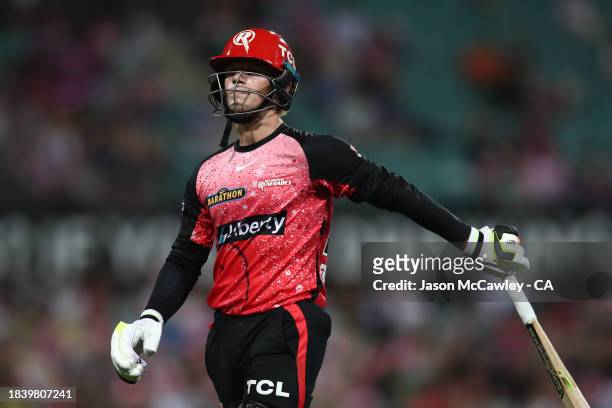 Jake Fraser-McGurk of the Renegades walks off the field after been dismissed by Ben Dwarshuis of the Sixers during the BBL match between Sydney...