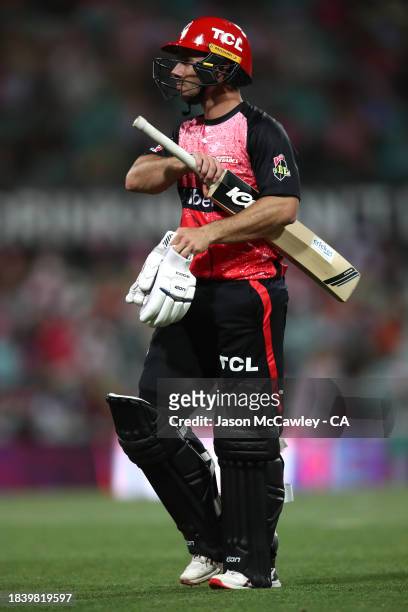 Jonathan Wells of the Renegades walks off the field after been dismissed by Steve O'Keefe of the Sixers during the BBL match between Sydney Sixers...