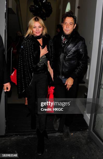 Kate Moss and Jamie Hince attend the Rimmel London 180 Years of Cool party at The London Film Museum on October 10, 2013 in London, England.