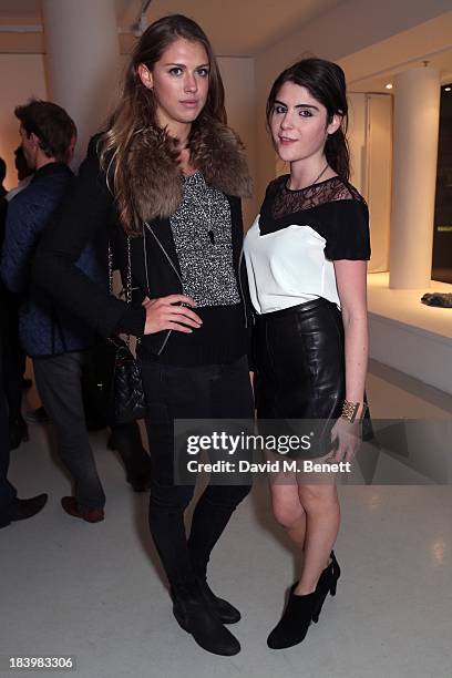 Lexy Abrams and Sabrina Parsley attends a private view 'Seize The Day Bed' by artist Billy Zane at Rook & Raven Gallery on October 10, 2013 in...