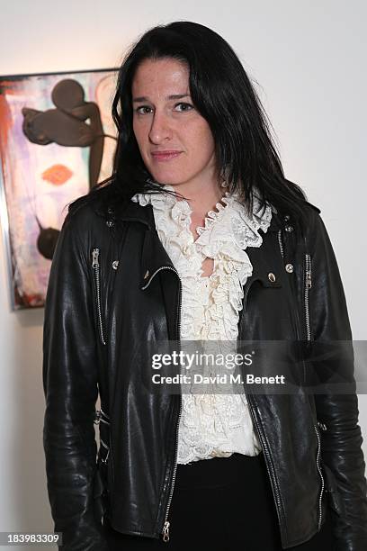 Amy Molyneaux attends a private view 'Seize The Day Bed' by artist Billy Zane at Rook & Raven Gallery on October 10, 2013 in London, England.