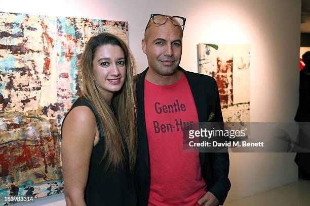 Rachelle Lunnon and Billy Zane attends a private view 'Seize The Day Bed' by artist Billy Zane at Rook & Raven Gallery on October 10, 2013 in London,...