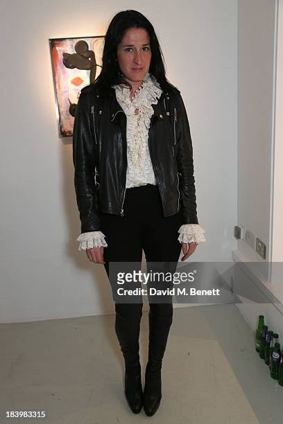 Amy Molyneaux attends a private view 'Seize The Day Bed' by artist Billy Zane at Rook & Raven Gallery on October 10, 2013 in London, England.