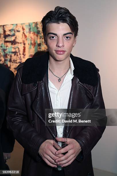 Sascha Bailey attends a private view 'Seize The Day Bed' by artist Billy Zane at Rook & Raven Gallery on October 10, 2013 in London, England.