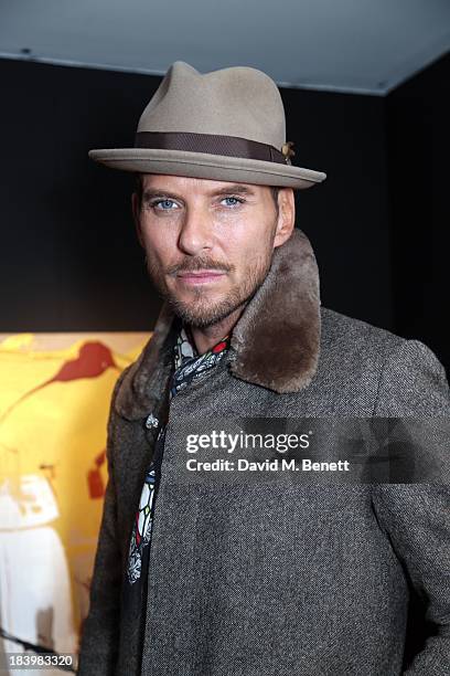 Matt Goss attends a private view 'Seize The Day Bed' by artist Billy Zane at Rook & Raven Gallery on October 10, 2013 in London, England.