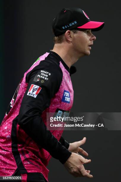 Steve Smith of the Sixers fields during the BBL match between Sydney Sixers and Melbourne Renegades at Sydney Cricket Ground on December 08, 2023 in...