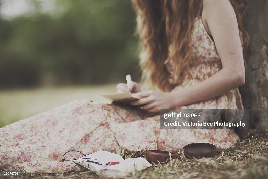 Girl writes a letter
