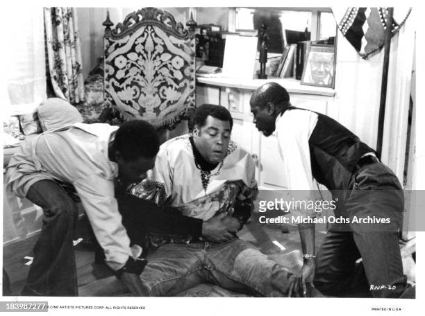 Actors Glynn Turman, James Earl Jones and Louis Gossett Jr. On set of the Cine Artists Picture movie "The River Niger" in 1976.