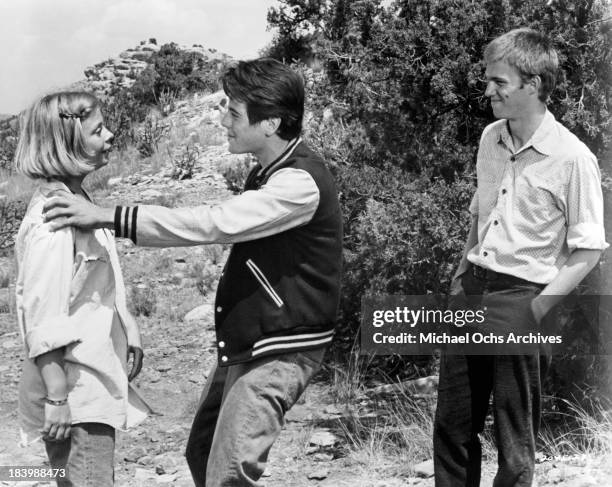 Actor Richard Thomas, actress Catherine Burns and actor Desi Arnaz Jr.on the set of the Universal Pictures movie "Red Sky at Morning" in 1971.