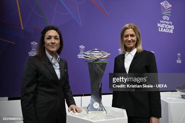 Managing Director of Women's Football Nadine Kessler and special guest Janni Arnth Jensen pose with the UEFA Women's Nations League trophy during the...