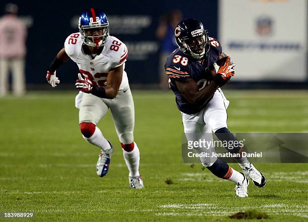 Defensive back Zack Bowman of the Chicago Bears intercepts a pass in the first quarter against the New York Giants during a game at Soldier Field on...