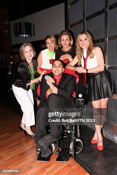 News team Cathy Jones, Polly Whitehouse, Emma Crosby and Sian Welby pose with Marvin Alfonso at the annual Newsroom's Got Talent event to raise money...