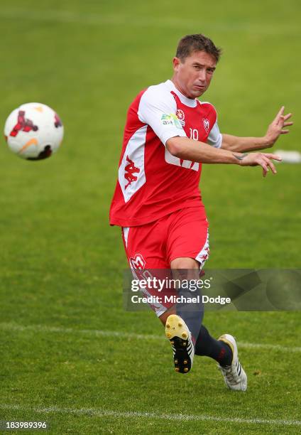 Harry Kewell kicks the ball during a Melbourne Heart A-League training session at Epping Stadium on October 11, 2013 in Melbourne, Australia.