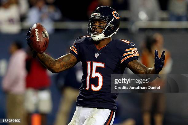 Wide receiver Brandon Marshall of the Chicago Bears celebrates a touchdown against the New York Giants during a game at Soldier Field on October 10,...