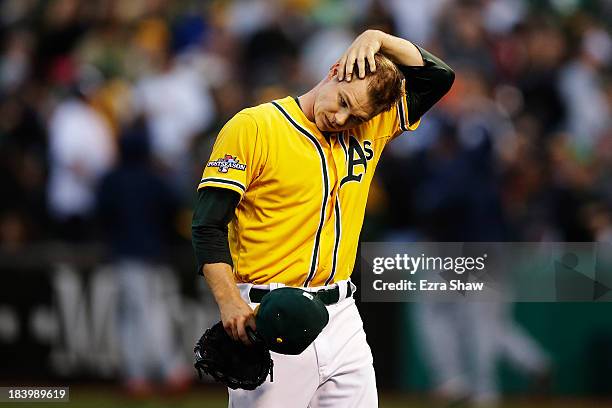 Sonny Gray of the Oakland Athletics walks off outfield the field in the fourth inning against the Detroit Tigers during Game Five of the American...