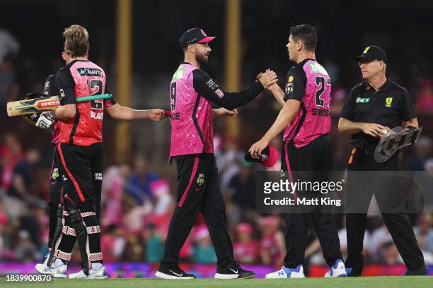 Sixers players celebrate victory during the BBL match between Sydney Sixers and Melbourne Renegades at Sydney Cricket Ground, on December 08 in...