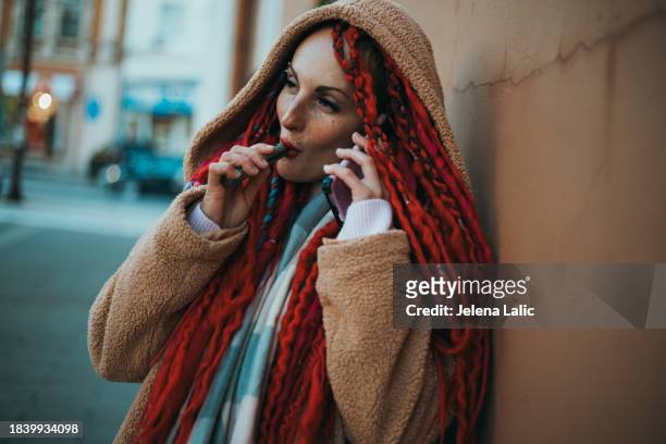 street life - eyebrow piercing stock pictures, royalty-free photos & images