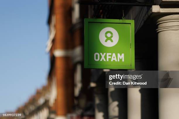 Sign outside a branch of an Oxfam book shop on December 08, 2023 in London, England. Employees of the charity shop who are members of the Unite union...