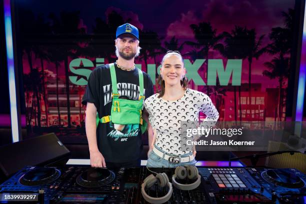 Tucker Halpern and Sophie Hawley-Weld of Sofi Tukker visit SiriusXM Studios on December 07, 2023 in Miami Beach, Florida.