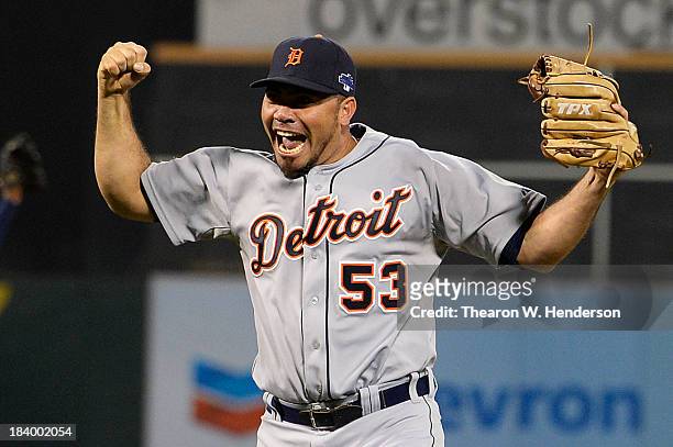 Joaquin Benoit of the Detroit Tigers celebrates their 3 to 0 win over the Oakland Athletics in Game Five of the American League Division Series at...