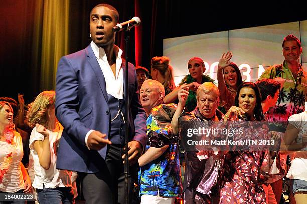 The ITV News team of Lawrence McGinty, Lucrezia Millarini and Nina Nannar enjoy Simon Webbe's performance with Blue at the annual Newsroom's Got...