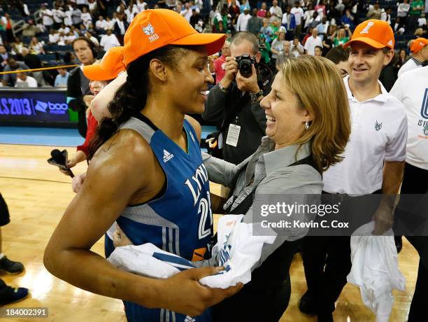 Head coach Cheryl Reeve of the Minnesota Lynx hugs Maya Moore after their 86-77 win over the Atlanta Dream in Game Three of the 2013 WNBA Finals at...