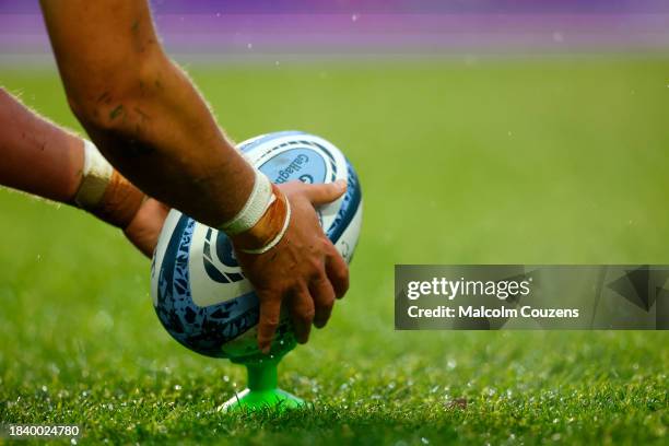 Handre Pollard of Leicester Tigers prepares to kick the ball from a kicking-tee during the Gallagher Premiership Rugby match between Leicester Tigers...