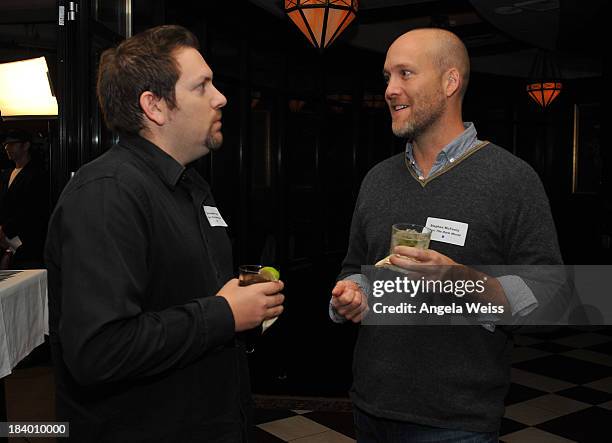 Screenwriters Christopher Yost and Stephen McFeely attend the 'Behind The Screen 2013' WGAW Screenwriters Press Reception at The Capital Grille on...