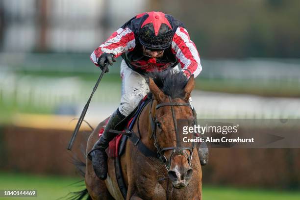 Harry Skelton riding Deafening Silence clear the last to win The Betfair Beacons Winter Novices' Hurdle at Sandown Park Racecourse on December 08,...