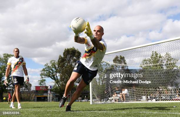 Goal keeper Ashley McGrath stops the ball during an Indigenous Australian International Rules Team training session at Gosch's Paddock on October 11,...