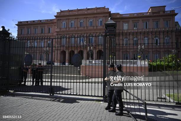 Police stand guard at the Casa Rosada presidential palace in Buenos Aires on December 11, 2023. Argentina's President Javier Milei took office Sunday...