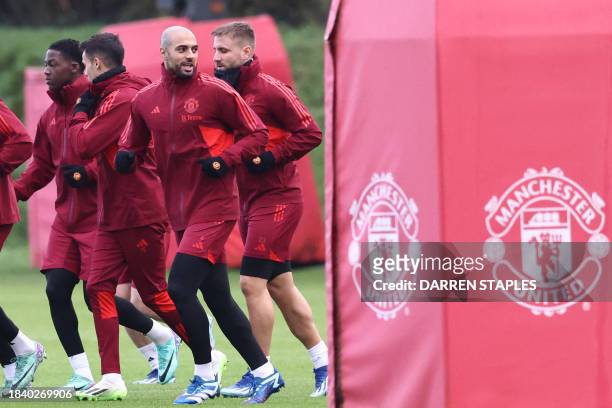 Manchester United's Moroccan midfielder Sofyan Amrabat takes part in a team training session at the Carrington Training Complex in Manchester,...