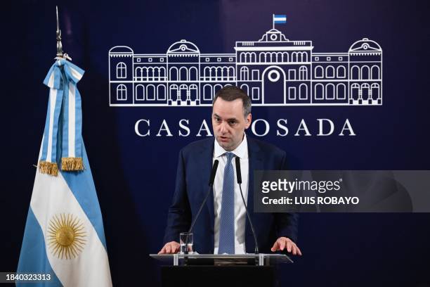 Argentina's presidential spokesman Manuel Adorni delivers a press conference at Casa Rosada presidential palace in Buenos Aires on December 11, 2023....