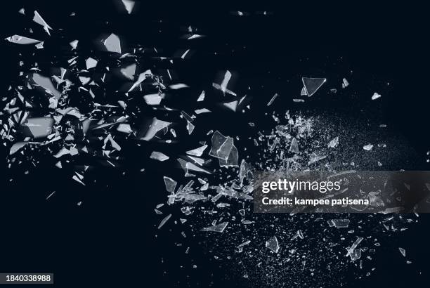 Broken Glass On Black Background Shows The Abstract Texture Of The Shattered Glass In Great Detail The Image Is Perfect For Use In Backgrounds Textures Or Abstract Art Projects High-Res Stock Photo