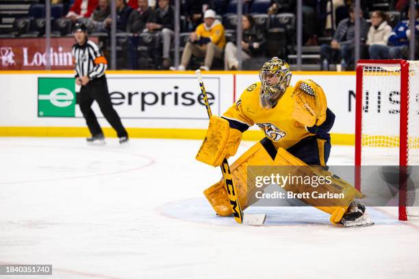 Juuse Saros of the Nashville Predators tends net against the Tampa Bay Lightning during the second period at Bridgestone Arena on December 7, 2023 in...