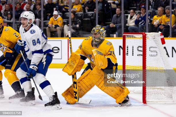 Juuse Saros of the Nashville Predators tends net against the Tampa Bay Lightning during the second period at Bridgestone Arena on December 7, 2023 in...