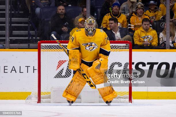 Juuse Saros of the Nashville Predators tends net against the Tampa Bay Lightning during the first period at Bridgestone Arena on December 7, 2023 in...
