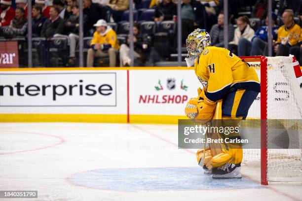 Juuse Saros of the Nashville Predators tends net against the Tampa Bay Lightning during the second period at Bridgestone Arena on December 7, 2023 in...