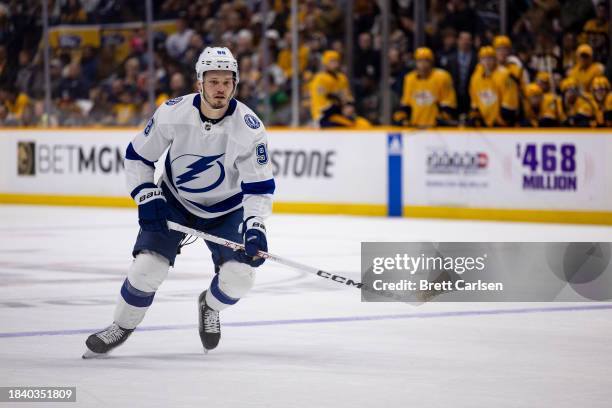 Mikhail Sergachev of the Tampa Bay Lightning skates against the Nashville Predators during the second period at Bridgestone Arena on December 7, 2023...